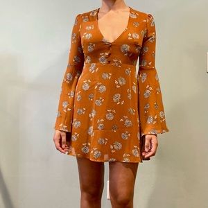 Orange dress with white daisies
